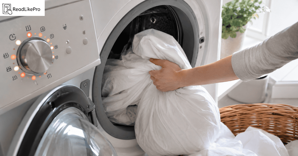 loading bedding into washing machine on hot setting to kill bed bug
